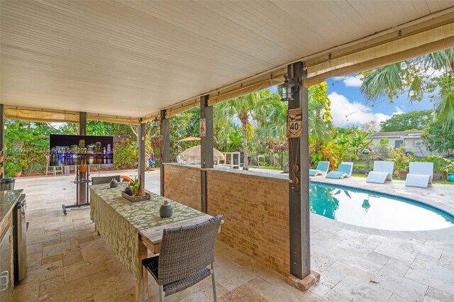 641 SW 50th Ave, Margate, FL 33068 - view of patio featuring an outdoor pool and outdoor dining space