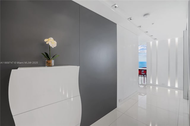 6899 Collins Ave Unit 2208, Miami Beach, FL 33141 - corridor featuring tile patterned flooring and baseboards