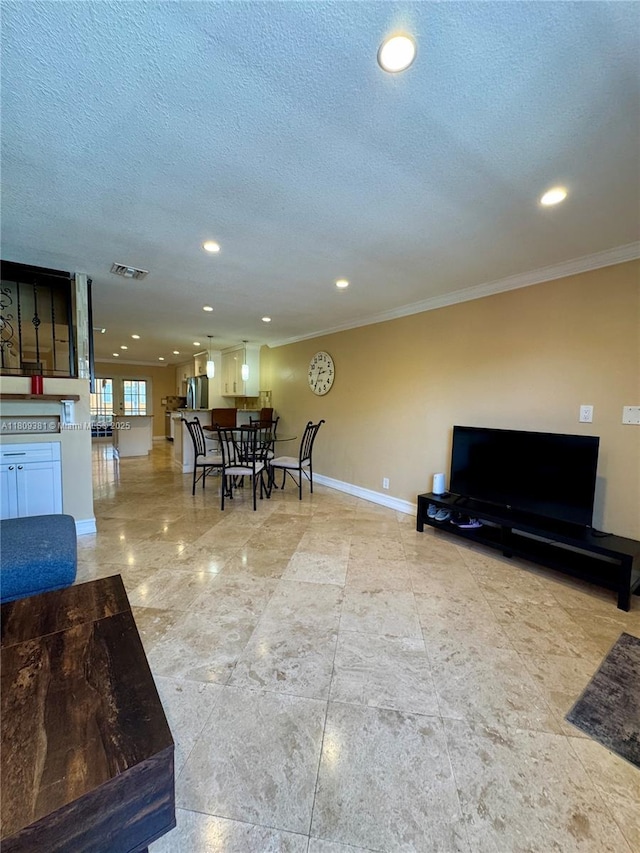 2200 Monroe St Unit 33, Hollywood, FL 33020 - living room featuring ornamental molding, baseboards, recessed lighting, and a textured ceiling