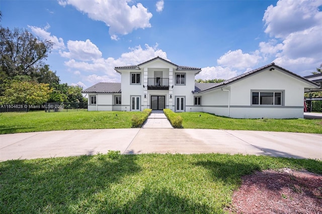 5121 SW 210th Ter, Southwest Ranches, FL 33332 - mediterranean / spanish house featuring a balcony and stucco siding