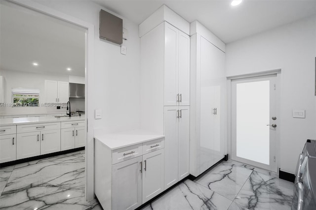 5121 SW 210th Ter, Southwest Ranches, FL 33332 - interior space featuring light marble finish floors, recessed lighting, and a sink