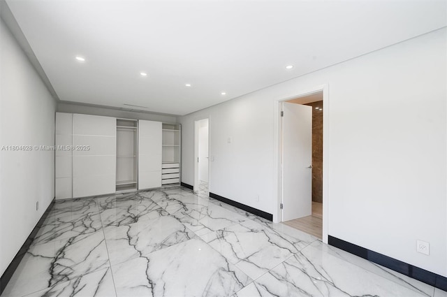 5121 SW 210th Ter, Southwest Ranches, FL 33332 - unfurnished bedroom featuring baseboards, light marble finish flooring, recessed lighting, and a closet