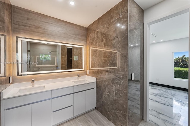 5121 SW 210th Ter, Southwest Ranches, FL 33332 - full bath featuring marble tiled floors, double vanity, a marble finish shower, and recessed lighting