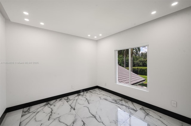 5121 SW 210th Ter, Southwest Ranches, FL 33332 - spare room with baseboards, recessed lighting, and light marble finish flooring