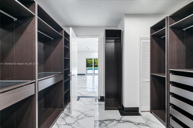 5121 SW 210th Ter, Southwest Ranches, FL 33332 - spacious closet featuring marble look tiles