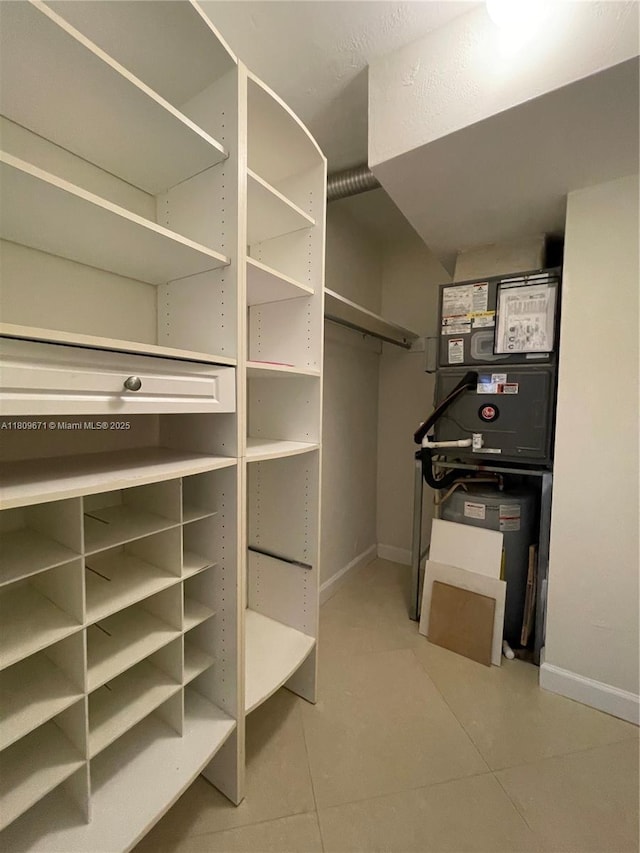 421 NE 1st St Unit 119, Hallandale Beach, FL 33009 - spacious closet with tile patterned floors