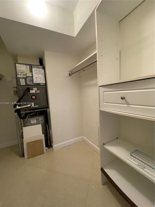 421 NE 1st St Unit 119, Hallandale Beach, FL 33009 - spacious closet with light tile patterned floors