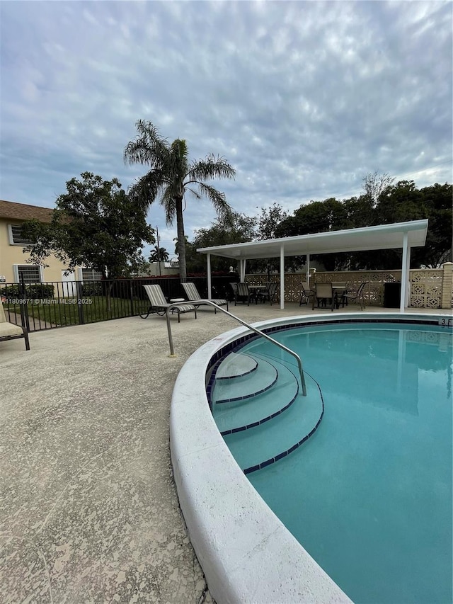 421 NE 1st St Unit 119, Hallandale Beach, FL 33009 - community pool featuring a patio area
