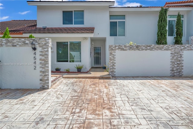 4542 SW 143rd Ct W, Miami, FL 33175 - view of front of property with stucco siding and a tiled roof