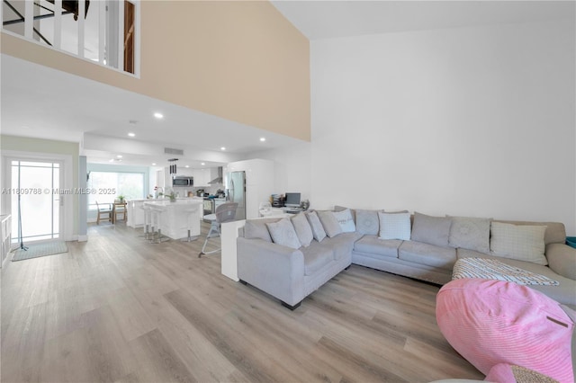 4542 SW 143rd Ct W, Miami, FL 33175 - living room featuring light wood-type flooring and a high ceiling