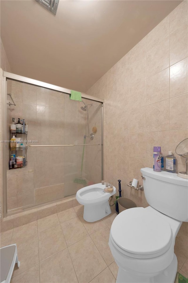 4542 SW 143rd Ct W, Miami, FL 33175 - full bath featuring toilet, tile walls, a shower stall, a bidet, and tile patterned floors