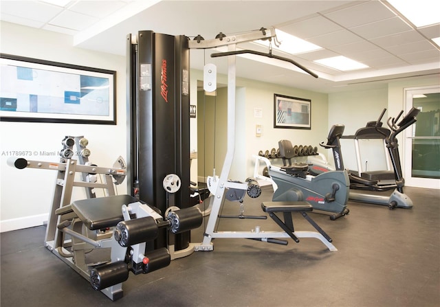 50 SW Menores Ave Unit 732, Coral Gables, FL 33134 - workout area featuring a paneled ceiling and baseboards