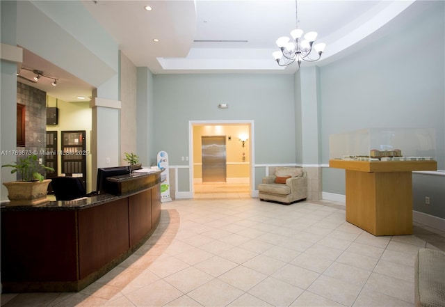 50 SW Menores Ave Unit 732, Coral Gables, FL 33134 - reception area with a towering ceiling and a chandelier