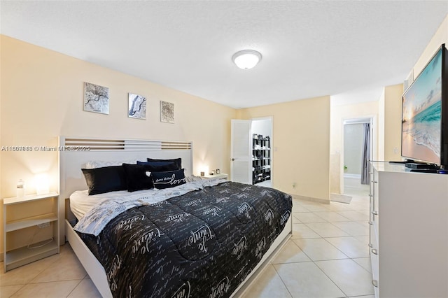 3161 S Ocean Dr Unit 607, Hallandale Beach, FL 33009 - bedroom featuring light tile patterned flooring and baseboards