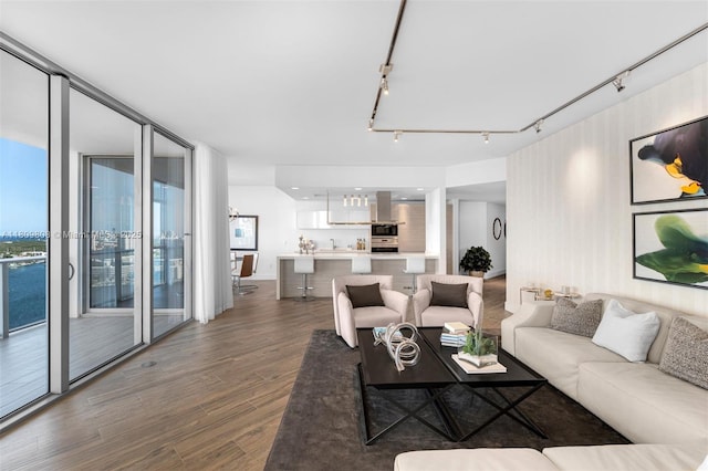 17301 Biscayne Blvd Unit 2210, North Miami Beach, FL 33160 - living room featuring wood finished floors and track lighting