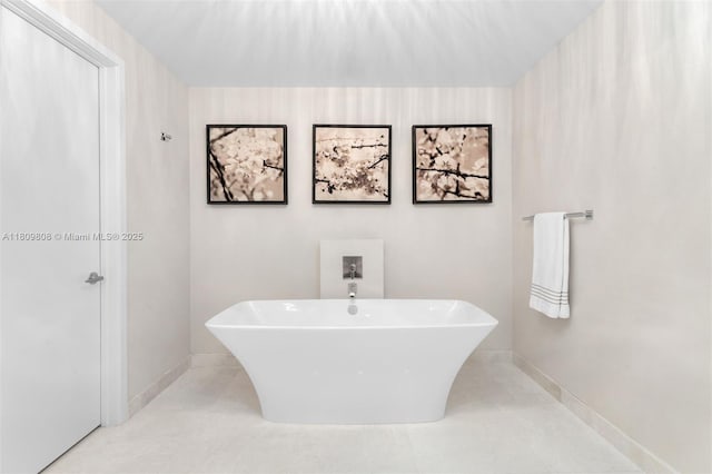 17301 Biscayne Blvd Unit 2210, North Miami Beach, FL 33160 - full bath featuring a freestanding tub and baseboards
