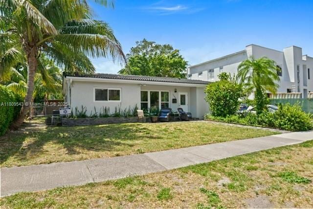 1240 NE 176th St, North Miami Beach, FL 33162 - single story home with stucco siding