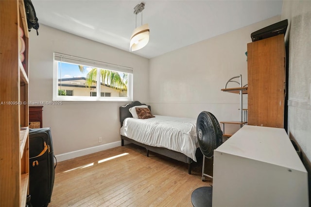 1240 NE 176th St, North Miami Beach, FL 33162 - bedroom featuring light wood-style floors and baseboards