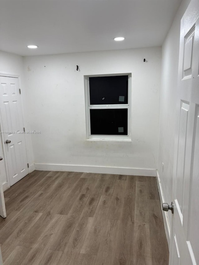 2325 Hayes St, Hollywood, FL 33020 - empty room featuring baseboards, wood finished floors, and recessed lighting