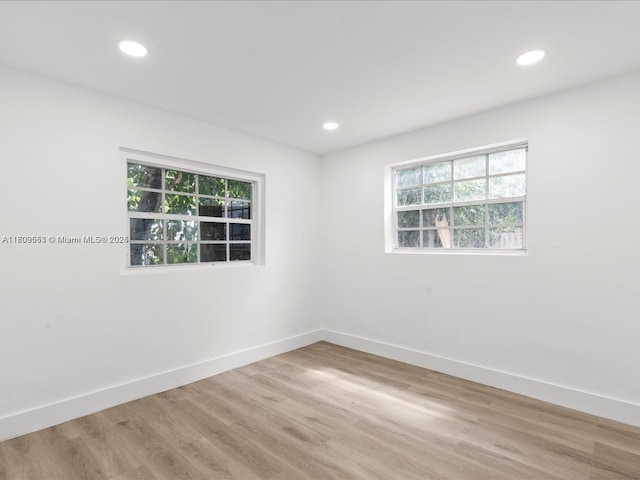 2325 Hayes St, Hollywood, FL 33020 - empty room with light wood finished floors, baseboards, and recessed lighting