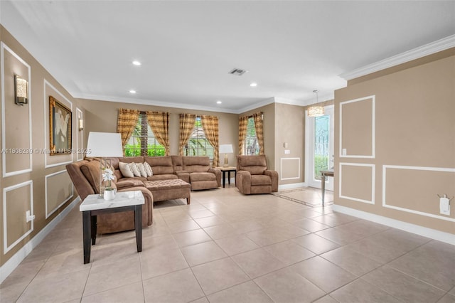 9003 Alexandra Cir, Wellington, FL 33414 - living area featuring crown molding, recessed lighting, light tile patterned floors, baseboards, and a decorative wall