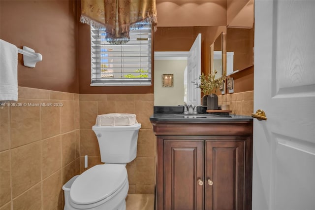 9003 Alexandra Cir, Wellington, FL 33414 - half bathroom with toilet, vanity, and tile walls