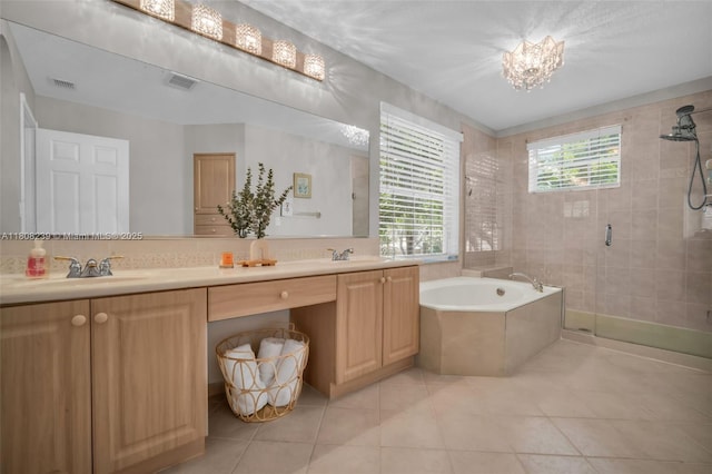 9003 Alexandra Cir, Wellington, FL 33414 - bathroom featuring a bath, double vanity, a shower stall, tile patterned flooring, and a chandelier