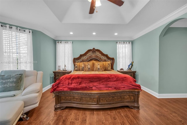 9003 Alexandra Cir, Wellington, FL 33414 - bedroom with arched walkways, wood finished floors, baseboards, recessed lighting, and ceiling fan