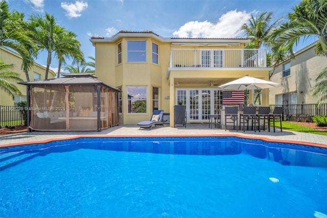 9003 Alexandra Cir, Wellington, FL 33414 - view of pool featuring a gazebo, french doors, a patio area, and a ceiling fan