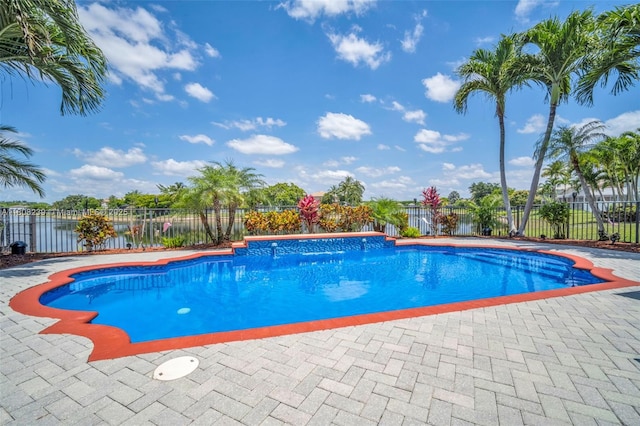 9003 Alexandra Cir, Wellington, FL 33414 - view of pool featuring a fenced backyard, a patio area, and a water view