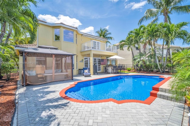 9003 Alexandra Cir, Wellington, FL 33414 - view of swimming pool featuring a gazebo, a patio area, and outdoor dining space