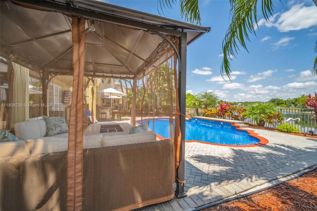 9003 Alexandra Cir, Wellington, FL 33414 - swimming pool featuring a gazebo, an outdoor hangout area, and a patio area
