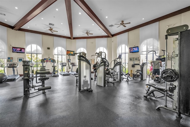 9003 Alexandra Cir, Wellington, FL 33414 - workout area featuring beamed ceiling, healthy amount of natural light, ceiling fan, and recessed lighting