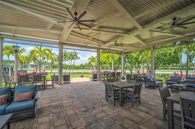 9003 Alexandra Cir, Wellington, FL 33414 - view of patio / terrace featuring a ceiling fan, outdoor dining area, and an outdoor hangout area