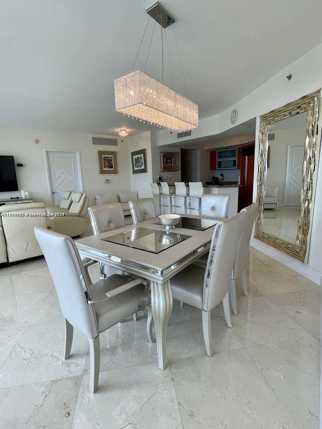 400 Alton Rd Unit 808, Miami Beach, FL 33139 - dining area with light marble finish flooring