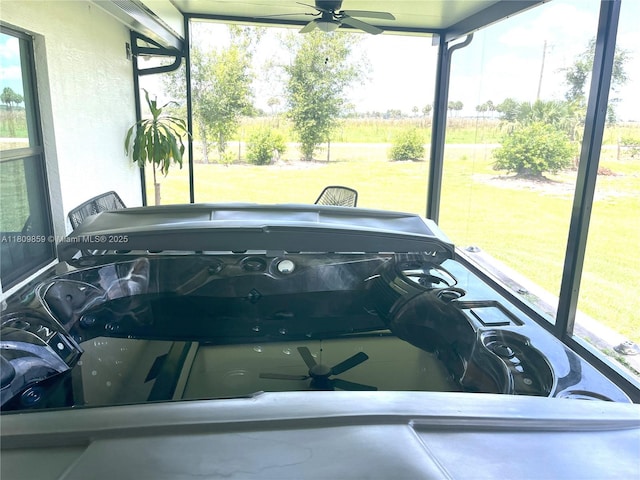 7935 NW 90th Ct, Okeechobee, FL 34972 - sunroom / solarium with a hot tub and ceiling fan
