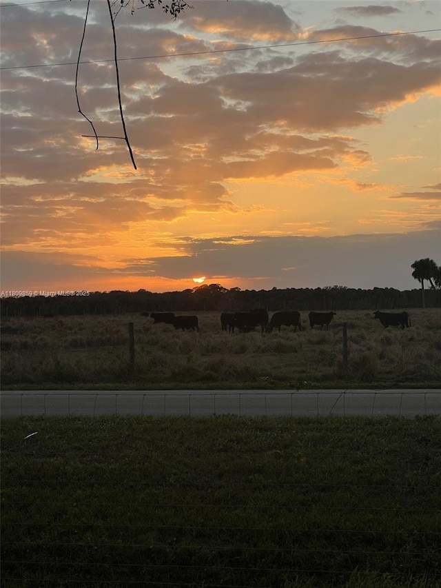 7935 NW 90th Ct, Okeechobee, FL 34972 - mountain view featuring rural landscape
