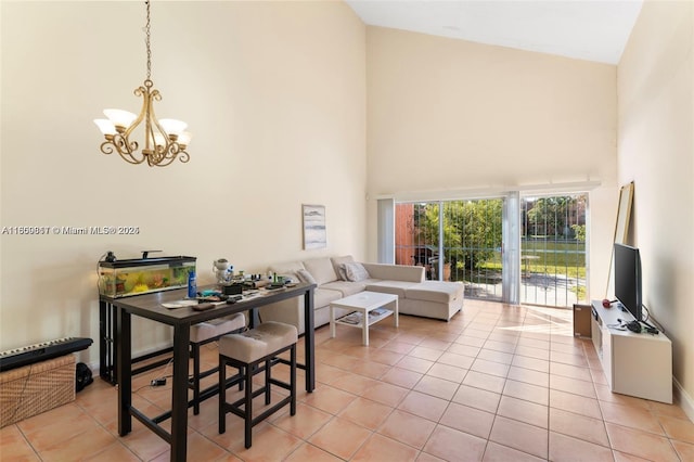 1649 NW 56th Ter Unit 9, Lauderhill, FL 33313 - living room featuring high vaulted ceiling, light tile patterned floors, and a chandelier