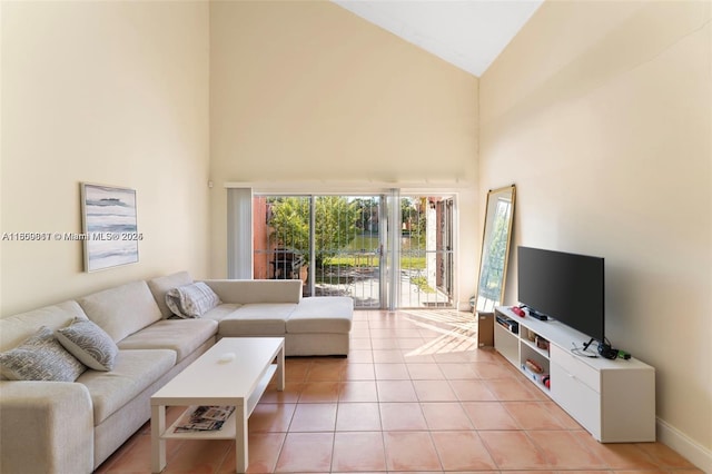 1649 NW 56th Ter Unit 9, Lauderhill, FL 33313 - living room featuring high vaulted ceiling, light tile patterned floors, and baseboards