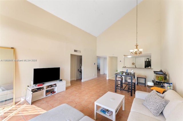 1649 NW 56th Ter Unit 9, Lauderhill, FL 33313 - living area with high vaulted ceiling, a chandelier, light tile patterned flooring, and baseboards