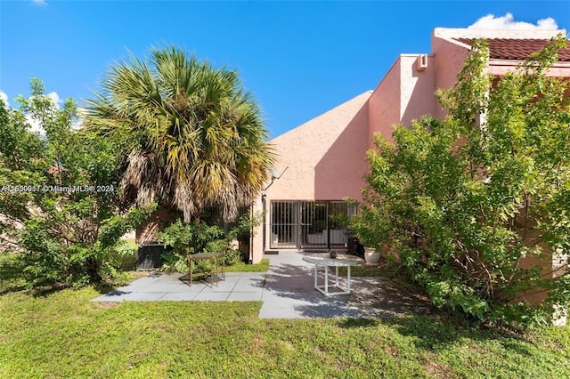 1649 NW 56th Ter Unit 9, Lauderhill, FL 33313 - view of green lawn with a patio area