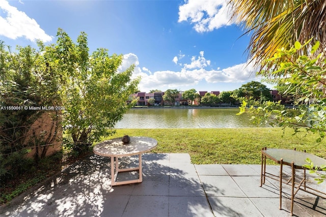 1649 NW 56th Ter Unit 9, Lauderhill, FL 33313 - view of patio / terrace with a water view
