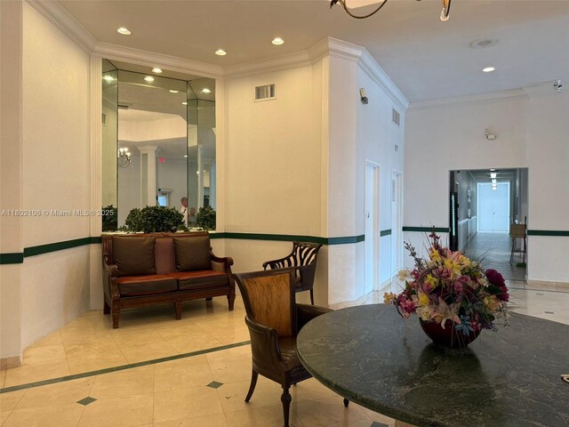 1301 NE Miami Gardens Dr Unit 1025W, Miami, FL 33179 - community lobby featuring ornamental molding and recessed lighting