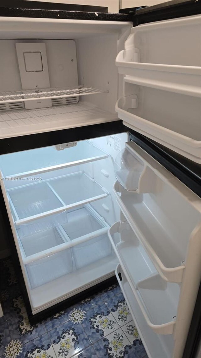 3300 Spanish Moss Ter Unit 210, Lauderhill, FL 33319 - kitchen view of fridge