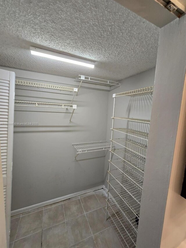 3300 Spanish Moss Ter Unit 210, Lauderhill, FL 33319 - spacious closet with tile patterned floors