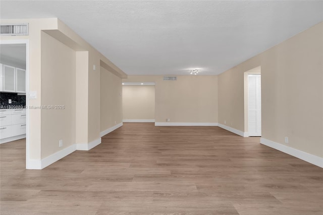 1904 S Ocean Dr Unit 1004, Hallandale Beach, FL 33009 - empty room with light wood-style floors and baseboards