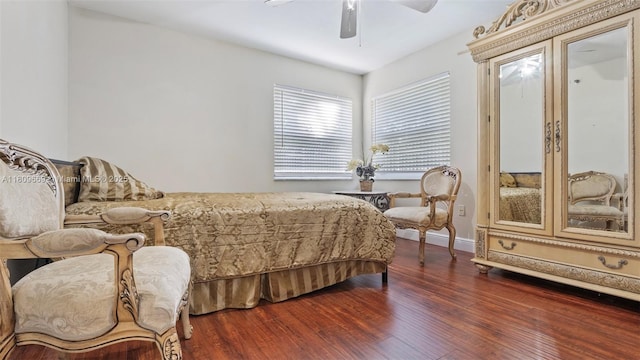 3910 Inverrary Blvd Unit 101-B, Lauderhill, FL 33319 - bedroom with dark wood-style flooring, baseboard heating, and a ceiling fan