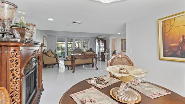 3910 Inverrary Blvd Unit 101-B, Lauderhill, FL 33319 - dining area with a fireplace, recessed lighting, and tile patterned flooring