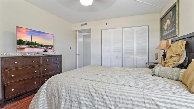 3910 Inverrary Blvd Unit 101-B, Lauderhill, FL 33319 - bedroom featuring dark wood-type flooring, a closet, and a ceiling fan
