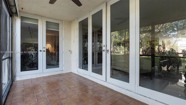 3910 Inverrary Blvd Unit 101-B, Lauderhill, FL 33319 - unfurnished sunroom featuring french doors, a ceiling fan, and a textured ceiling